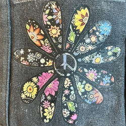 Blomst med peacelogo